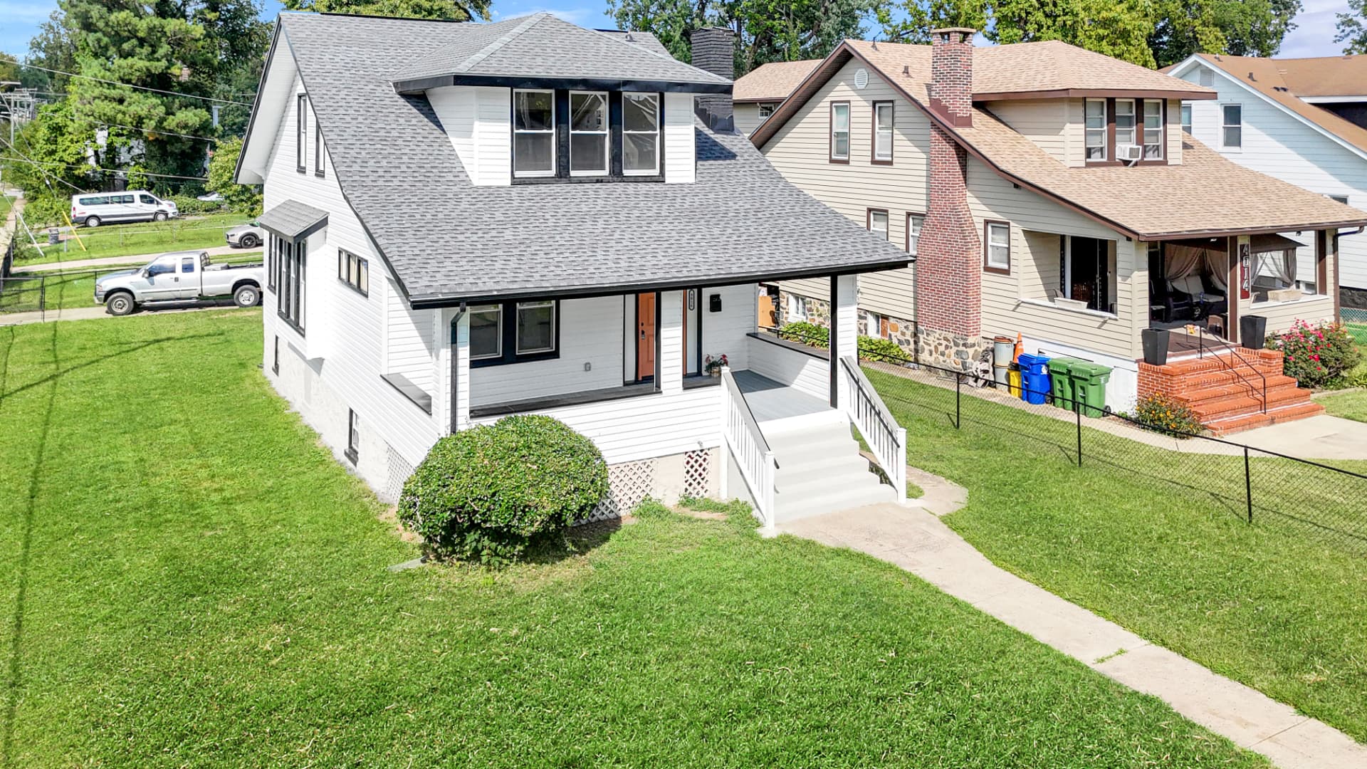 4016 Baltimore home — aerial drone photo of the front exterior and landscaped yard